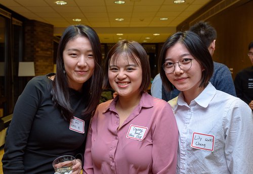 Members of the Financial Mathematics program posing with name tags