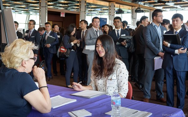 Student speaking with Recruiter at career fair